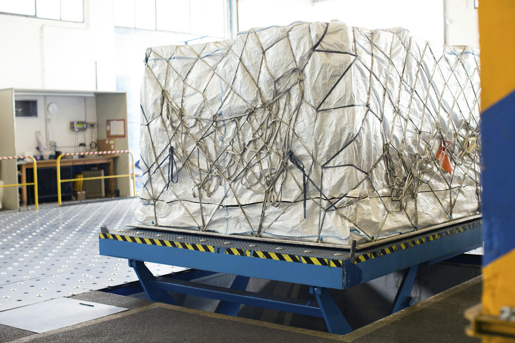 Air freight on lifting machine in air freight warehouse